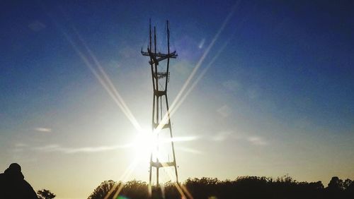 Low angle view of windmill against sky