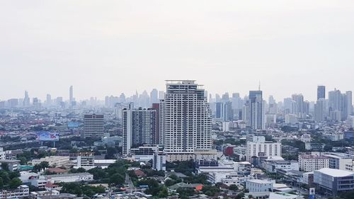 Modern buildings in city against sky