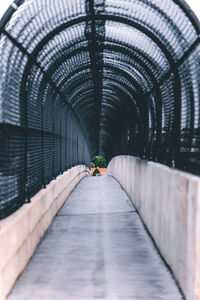 Empty footbridge with arch