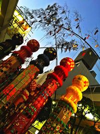 Low angle view of lanterns hanging on tree