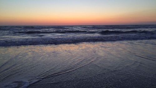 Dramatic sky over sea during sunset