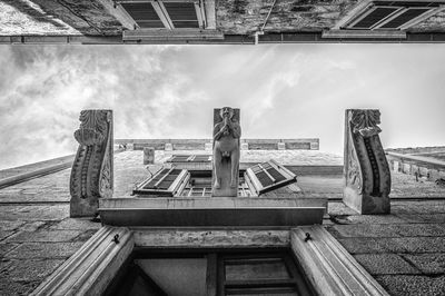 Statue of historic building against sky