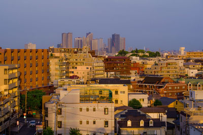 Cityscape against clear sky