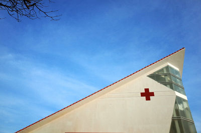 Low angle view of building against blue sky