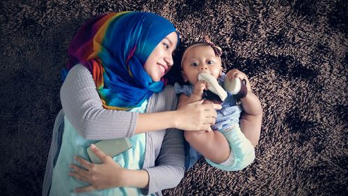 Portrait of happy mother and daughter