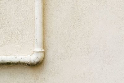 Close-up of pipe on wall