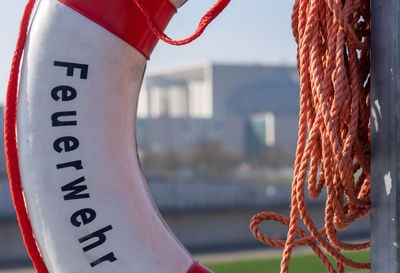 Close-up of chain hanging on rope