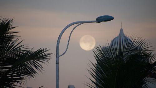 Low angle view of moon against sky