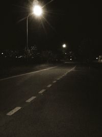 Illuminated street lights at night