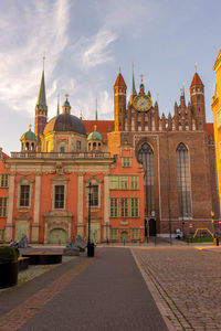 Facade of historic building against sky