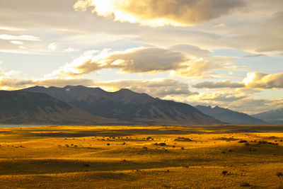 Scenic view of landscape against sky during sunset