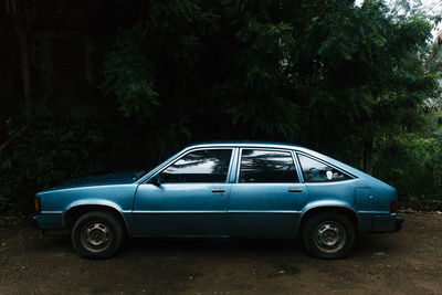 Vintage car parked on land