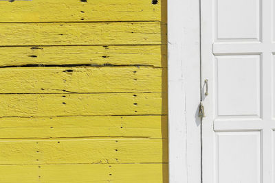 Full frame shot of closed wooden door of building