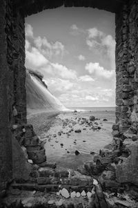 Scenic view of sea against cloudy sky