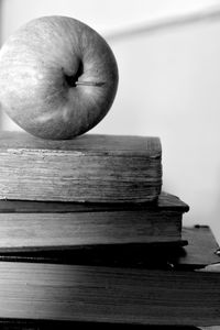 Close-up of apple on wooden table