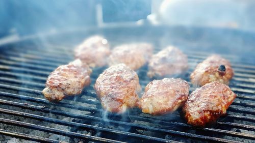 Close-up of meat on barbecue grill