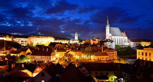 View of town against cloudy sky