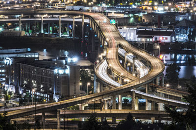 High angle view of elevated roads in city at night