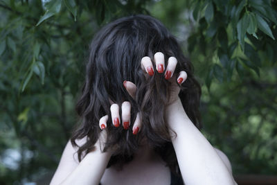 Woman with her fingers in her hair