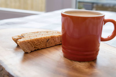 Close-up of biscotti and coffee on table