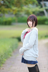 Portrait of young woman in japanese school uniform