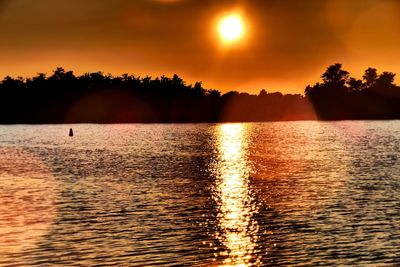 Sunset over calm lake