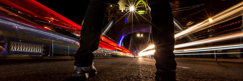 Light trails on illuminated city at night