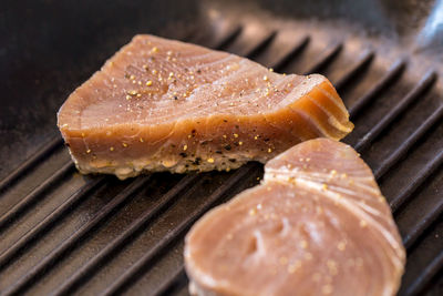 Close-up of meat on barbecue grill
