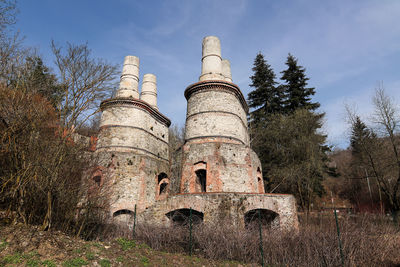 Low angle view of old building against sky