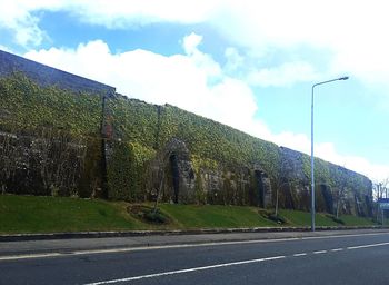 Road against cloudy sky