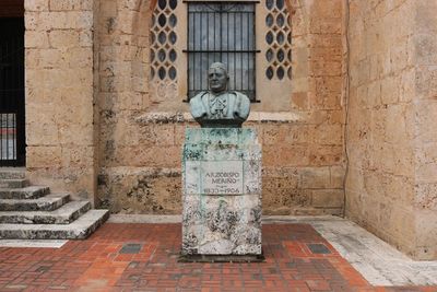 Close-up of statue against building