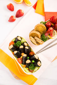 High angle view of fruits in plate on table