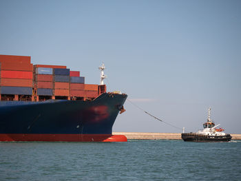 View of ship in sea against clear sky