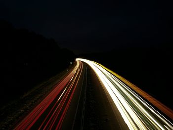 Light trails on road at night