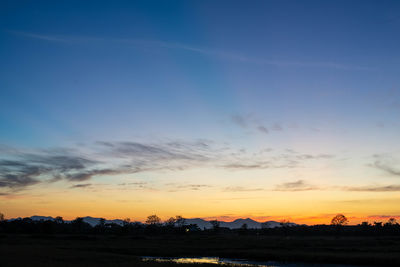 Scenic view of silhouette landscape against sky during sunset