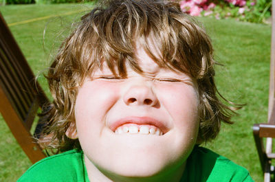 Close-up portrait of smiling boy