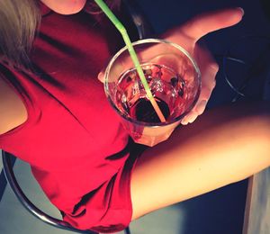 Close-up of hand holding wine glass