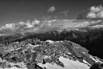 Scenic view of snowcapped mountains against sky