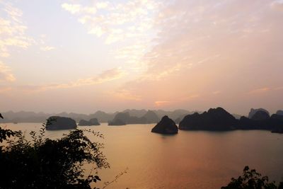 Scenic view of sea against sky at sunset