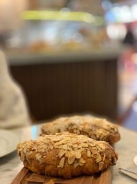 Close-up of baked pasty item on wood