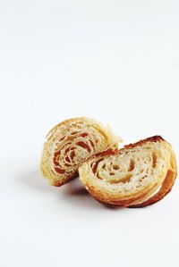 Close-up of cake against white background