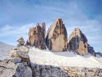 Pebbles pyramid. stones on alpine gravel at tre cime di lavaredo, view from tour around at april day