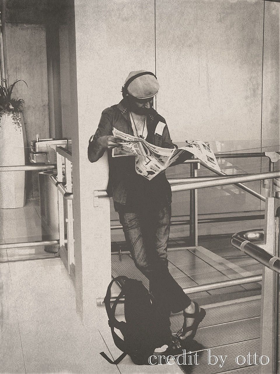 WOMAN STANDING ON RAILING