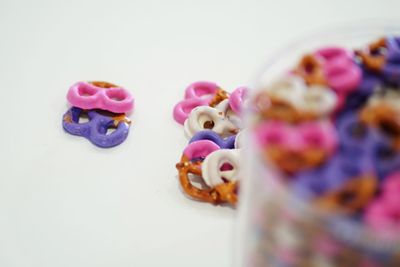 Close-up of candies against white background