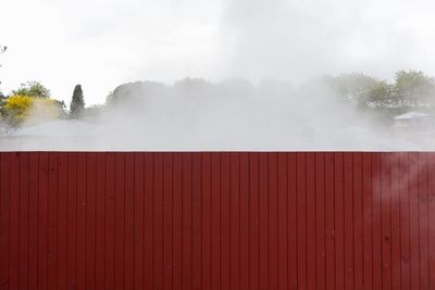 Scenic view of fog against sky