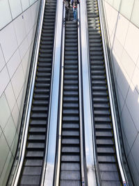 High angle view of people on escalator