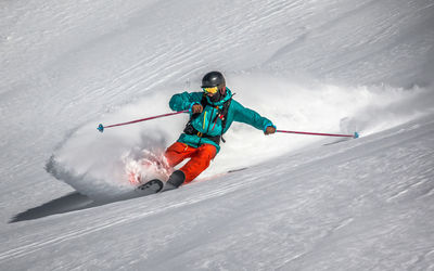 High angle view of man skiing on snow