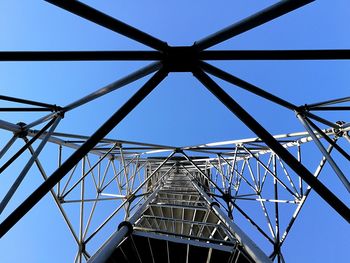 Low angle view of metal structure against sky