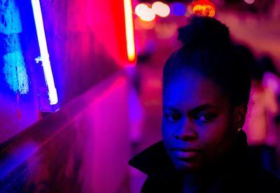 Portrait of young woman looking away