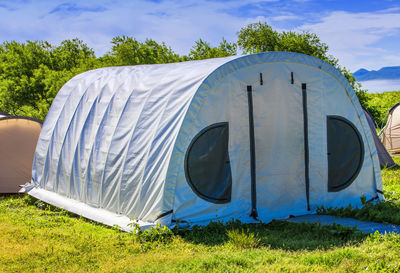 View of tent on field against sky